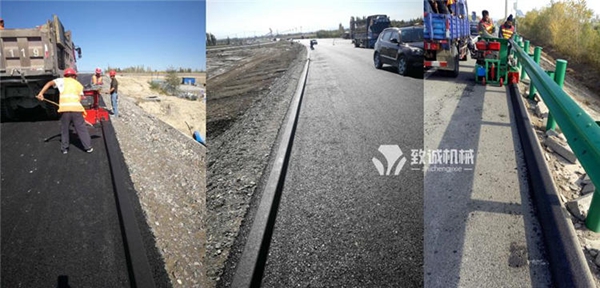 瀝青砂攔水帶滑模機施工現場